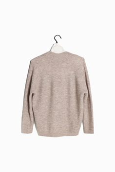 This luxurious ribbed knit sweater boasts comfort and warmth with its soft composition and one size fit. Its V-neck silhouette and long sleeves make it a stylish staple for timeless elegance. Ribbed Knit Sweater, How To Introduce Yourself, Knit Sweater, Timeless Elegance, Make It, Ribbed Knit, Knitted Sweaters, Composition, Long Sleeves