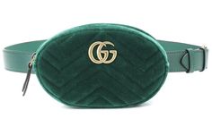 For SS18, Gucci reimagines its GG Marmont style in emerald-green quilted velvet for this belt bag. It's crafted in Italy, and features an antiqued gold-tone metal front plaque with the top-zip opening to a red satin lining. It's designed to be worn high on the waist, and can also be slung across the body and carried as a clutch, thanks to the detachable and adjustable buckle-fastening strap. Position yours over the house's separates for an on-brand look. Size 95cm Luxury Belted Bag For Formal Occasions, Luxury Rectangular Bags With Belt Detail, Luxury Formal Bag With Belt Detail, Luxury Belt Bag With Gold-tone Hardware For Formal Occasions, Luxury Formal Belt Bag With Gold-tone Hardware, Luxury Green Quilted Bag, Luxury Gucci Bags With Metal Logo, Gucci Velvet Marmont Bag, Gucci Gg Marmont Matelasse