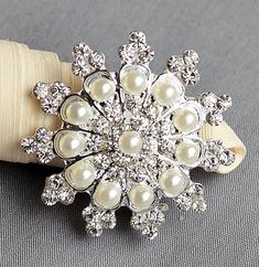 "This listing is for 10 pieces of high quality sparkling rhinestone crystal brooches only. Measurements (approx): 1-3/8\" (30mm) in width Materials: silver metal Australian rhinestones Qty: 1 pc Custom Orders If you need a larger quantity, please contact us and we'll be more than happy to fill your request. Expedited shipping Please add one of the following items into your shopping cart: https://www.etsy.com/shop/yourperfectgifts/search?search_query=mail+sp If you do not have a PayPal account an Cake Invitation, Brooch Bouquet Diy, Bouquet Cake, Bridal Brooch, Bridal Brooch Bouquet, Wedding Brooch Bouquets, Wedding Cake Decorations, Brooch Bouquet, Wedding Brooch