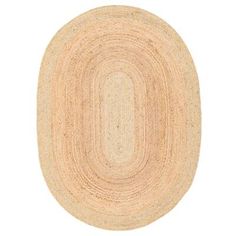 the oval rug is made from natural materials and has a light brown color on it