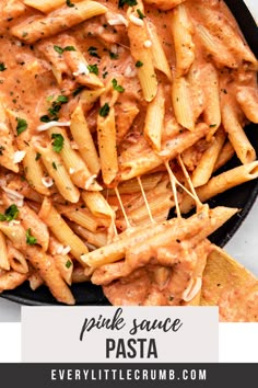 pasta with sauce and parmesan cheese in a skillet