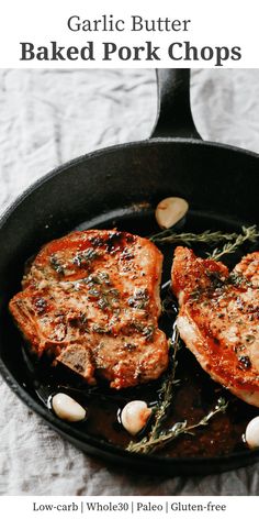 garlic butter baked pork chops in a cast iron skillet