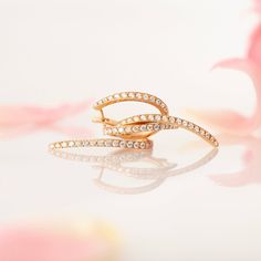 62 diamonds form a striking twist in 6.25 grams of 18k recycled gold. Sold as a pair. Twist Earrings, Marquise Ring, Recycled Gold, Engagement Jewelry, Brilliant Diamond, White Rose Gold, Quality Diamonds, Bling Bling, 18k Rose Gold