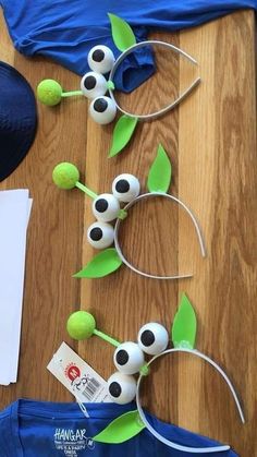 an assortment of items made to look like plants with googly eyes and green leaves