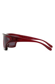 Curved lenses and logo-accented temples add visual intrigue to mask sunglasses designed in collaboration with the boutique Paula's Ibiza. 70mm lens width; 17mm bridge width; 115mm temple length 100% UV protection CR-39 lenses Injected plastic Made in Italy Modern Red Shield Sunglasses With Gradient Lenses, Modern Red Tinted Shield Sunglasses, Red Modern Shield Sunglasses With Uv Protection, Modern Red Shield Sunglasses With Uv Protection, Modern Red Polarized Shield Sunglasses, Red Modern Shield Sunglasses With Polarized Lenses, Modern Red Shield Sunglasses With Polarized Lenses, Mask Sunglasses, The Boutique