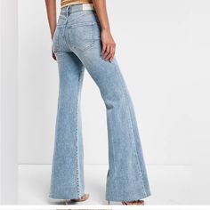 Express 70’s Flare Mid Rise Jeans Nwt . Super Cute . Retro Style . Size 2r . Flat Lay Measurement Waist 14 Inch . Rise 10 Inch . Inseam 33 Inch . Raw Hem . Light Wash Fitted Retro Flare Jeans, Retro Fitted Light Wash Flare Jeans, 70s Inspired Fitted Flare Jeans For Spring, 70s Inspired High Rise Jeans For Spring, 70s Inspired Denim Bottoms, 70s Inspired Spring Jeans, Express Jeans, Mid Rise Jeans, 10 Inch