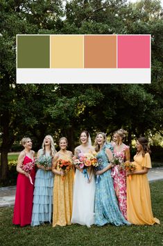 a group of women standing next to each other in front of trees with color swatches