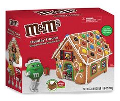 the m & m's holiday house gingerbread cookie kit is in its box