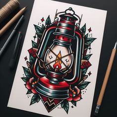 a drawing of a lantern on top of a piece of paper with pencils next to it