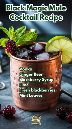 black magic mule cocktail recipe with raspberries, lime and mint leaves in copper mug