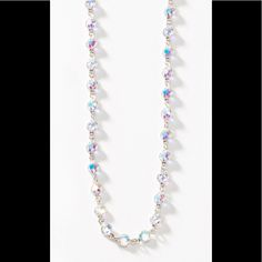 This Is The Touchstone Crystal Chanelle Necklace With Swarovski Crystals In Aurore Boreale. The Necklace Is An Endless Chain 36 Inches And Looks Great Alone Or Spectacular When Layered! As In Photo 2. Wear It Long Or Doubled Up With A Converter. A Wardrobe Essential! New In Box. Retail 102 Iridescent Crystal Jewelry With Rhinestones, Elegant Iridescent Crystal Necklaces, Iridescent Crystal Necklaces For Party, Elegant Iridescent Crystal Jewelry, Elegant Iridescent Crystal Necklace, Iridescent Crystal Jewelry With Faceted Beads, Crystal Necklaces With Sparkling Round Beads, Swarovski Heart Necklace, Interlocking Circle Necklace