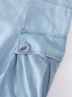 This Button Cargo Pocket Skirt-Denim is expertly designed to provide both style and functionality. The perfect addition to any wardrobe. Summer Straight Leg Skirt With Button Closure, Blue Cotton Bottoms With Buttoned Pockets, Washed Blue Denim Bottoms With Buttons, Blue Button-up Bottoms With Pockets, Denim Bottoms With Pockets And Button-up Design, Straight Leg Bottoms With Buttoned Pockets For Summer, Summer Straight Leg Bottoms With Buttoned Pockets, Blue Bottoms With Buttoned Pockets For Summer, Summer Blue Bottoms With Buttoned Pockets