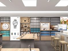 the inside of a store with several tables and chairs in front of shelves filled with items