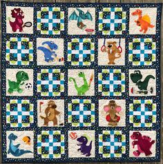 a quilt with different dinosaurs on it