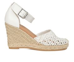 Embrace the espadrille trend with the Sierra from Journee Collection. The woven faux leather detail on the closed toe material is a showstopper, and the ankle strap and square buckle accent add the perfect flare. It features a beautiful espadrille design on its tall 3 �" wedge heel and a soft, cushioned insole for all-day comfort. Faux leather upper,Buckle closure,Approx. 3 3/4 inch espadrille wedge heel,Round toe,Cushioned footbed for added comfort,Synthetic outsole,Woven detail for added style Ankle Strap Espadrilles With Buckle Closure, White Woven Sandals For Spring, White Straw Espadrilles With Ankle Strap, Spring Synthetic Espadrilles With Ankle Strap, Spring Synthetic Ankle Strap Espadrilles, Spring Woven Heels With Round Toe, Adjustable Ankle Strap Espadrilles With Buckle, Adjustable Heels With Woven Sole For Spring, Spring Synthetic Espadrilles With Adjustable Fit