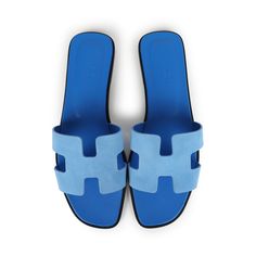 This pair of Oran sandals are in Bleu Cameo suede goatskin, with the iconic H cutout detail, Bleu Cameo leather goatskin insole, and natural leather soleOrigin: ItalyCondition: New and never wornAccompanied by: Hermes box, dustbags, ribbonSize: 40.5 EU Luxury Blue Mules, Luxury Blue Leather Mules, Blue Suede Sandals With Leather Footbed, Luxury Suede Mules For Summer, Blue Sandals With Flat Leather Sole, Blue Flat Heel Sandals With Leather Sole, Blue Sandals With Leather Sole And Flat Heel, Designer Suede Sandals With Leather Sole, Blue Leather Mules With Leather Sole