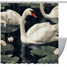 two white swans swimming in the water with lily pads on the side shower curtain set