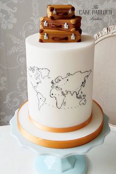 there is a cake with luggage on it