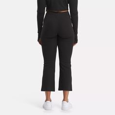 Loungewear gets a fresh makeover in these women's Reebok leggings. Perfect for downtime at home or relaxed weekends running errands, they're made from a soft and stretchy material that fits close to you. Flared hems add modern style, and a high-rise waist delivers confident coverage. Athleisure Stretch Sweatpants With Go-dry, Sporty Stretch Elastane Joggers, Sporty Elastane Stretch Joggers, Stretch Go-dry Sweatpants In Athleisure Style, Stretch Go-dry Sweatpants For Athleisure, Black Relaxed Fit Sporty Leggings, Casual Compression Yoga Pants For Loungewear, Sporty Stretch Yoga Pants For Loungewear, Spring Yoga Pants For Workout With Comfort Stretch