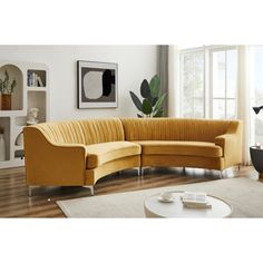 a living room scene with focus on the corner sofa