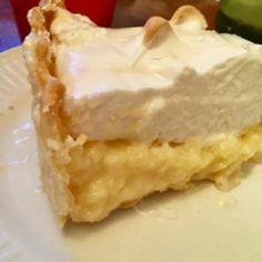 a piece of pie sitting on top of a white plate