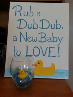 there is a sign that says rub a dub dubb, a new baby to love