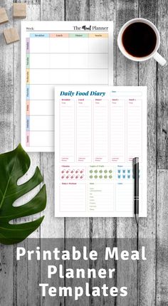 the printable meal planner is on top of a wooden table with a cup of coffee and