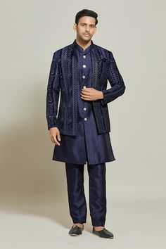 Blue velvet jacket with thread and sequin embroidery. Paired with a sleeveless button down kurta and pant. - Aza Fashions Blue Velvet Jacket, Men Kurta, Embroidered Pants, Sequin Embroidery, Kurta With Pants, Velvet Jacket, Sequins Embroidery, Embroidered Jacket, Band Collar