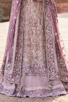 Luxury Pakistani Bridal Dress in Lilac Kameez Lehenga Style is a stunning masterpiece adorned with cut-dana, sequins, stones, and pearls. Lehenga Dupatta Style, Valima Dress, Lehenga Kameez, Lilac Lehenga, Kameez Style, Bridal Lehenga Pakistani, Kameez Lehenga, Pakistani Bridal Lehenga, Pakistani Bridal Dress