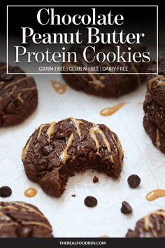 chocolate peanut butter protein cookies on a sheet of parchment paper with the words, chocolate peanut butter protein cookies