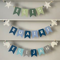 the bunting banner is decorated with elephants and stars