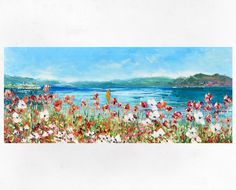 a painting of flowers by the ocean with mountains in the background and blue sky above