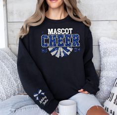 Custom Cheer Sweatshirt, Cheer Faux Glitter Sweater ,Cheer Squad Sweaters, Megaphone Hoodie, Cheer Mom with Name Sweater, Personalized Cheer Perfect gift for friends, family, and all loved ones. Order affordable, high-quality, personalized t-shirts.  Carefully hand-printed using the latest technology printing houses and water-based ink. Thanks for choosing us.  WHAT SIZE FITS ME BEST  Please scroll through the photos. Measurements for clothing types and sizes are listed as well.  These are a uni Cheer Sweatshirts Design, Cheer Sweatshirts, Cheer Fits, Glitter Sweater, Name Sweater, Cheer Squad, Cheer Team, Cheer Mom, Clothing Brands