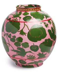 a pink vase with green leaves and flowers on it's sides, sitting against a white background