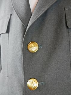 "This military jacket is in near mint condition and is a prime example of exquisite vintage Norwegian military tailoring. The European officer blazer is gunmetal gray, has a notch collar, and closes in the front with two gold buttons. The buttons have an upright crowned lion on them, as do the pockets on the four pockets on the front of the jacket (2 flap pockets at hip level and two on the chest). The NATO jacket has a center back vent that allow complete ease of movement. The jacket is fully l Vintage Military Outerwear With Buttons, Military Style Button-up Blazer With Button Closure, Military Style Blazer With Button Closure, Military Style Blazer With Lapel Collar And Button Closure, Military Style Work Blazer With Buttons, Military Style Workwear Blazer, Military Style Blazer With Buttons For Workwear, Military Style Formal Blazer With Buttons, Formal Military Outerwear With Button Closure