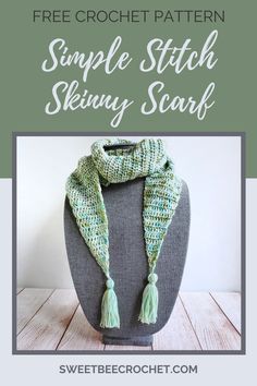 a green knitted scarf sitting on top of a gray mannequin with text overlay that says, free crochet pattern simple stitch sleiny scarf