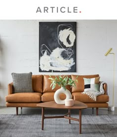 a living room filled with furniture and a painting on the wall above it that says article