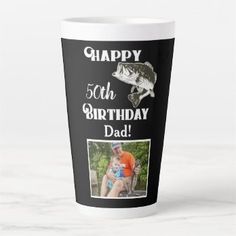 a coffee cup with a photo of a man holding a fish and the words happy birthday dad on it