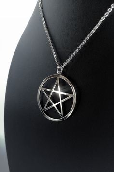 a necklace with a pentagramil on it