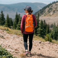 The Pocket Backpack folds into a small self-contained bag for easy storage. Built strong and water-resistant, this foldable day-pack is perfect for your next adventure. Features: Folds Up Small: This roomy 30-liter backpack folds up small – easily zips into front pocket 8”x9” for compact and easy storage. Weighing in at 9 ounces, this “grab and go” foldable backpack won’t weigh you down. The sandwich sized storage bag includes a small handle that allows you to attach to other bags or hang on the Functional Foldable Bags For Outdoor Activities, Functional Orange Backpack For Travel, Functional Orange Travel Backpack, Nylon Backpack With Water Bottle Pocket For Adventure, Multifunctional Backpack For Hiking, Versatile Durable Backpack For Outdoor, Versatile Durable Outdoor Backpack, Durable Versatile Outdoor Backpack, Practical Backpack With Ykk Zipper For Outdoor