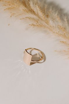 Bold and Beautiful! The perfect ring for making a statement and standing out. This ring is truly a favorite of ours and we know it will be a favorite of yours as well! Gold-filled is the closest alternative to solid gold. Gold filled jewelry has a thick layer of solid gold bonded onto the base layer, usually brass or sterling silver. Compared to gold plated which uses a process of electroplating that quickly dips your jewelry in gold, resulting in a miniscule layer of gold, gold-filled is much m Rectangle Ring, Gold Bond, Square Rings, Bold And Beautiful, Gold Filled Jewelry, Perfect Ring, Gold Gold, Base Layer, Feel Confident