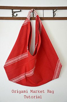 an origami market bag hanging on a hook