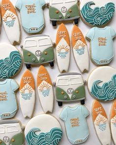 decorated cookies in the shape of surfboards and vans