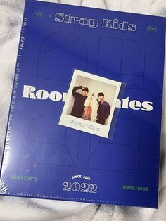 a blue book with an image of two people on it and the words rooties