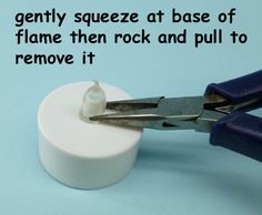 a pair of scissors cutting through a rock and pull to remove it from the base