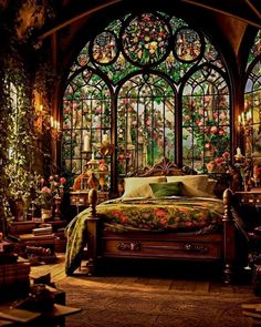 an ornate bedroom with stained glass windows and lots of greenery on the bedding