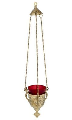 a red bowl hanging from a chain on a white background