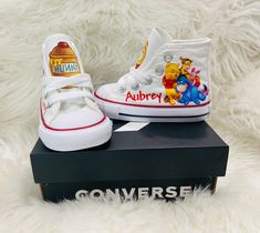 children's white shoes with winnie the pooh on them