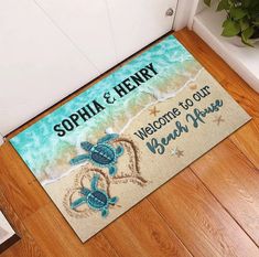 welcome to our beach house door mat with sea turtle and starfish on the beach