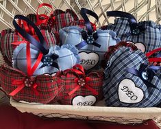 several blue and red hearts are in a basket